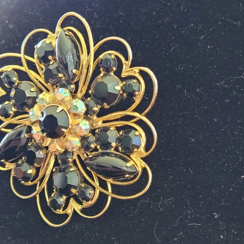 Vintage WEISS Black Rhinestone Flower Brooch Aurora Borealis Gold Tone Pin
